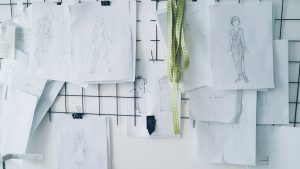 Fashion design sketches and clothing concepts for NIFT Registration 2027